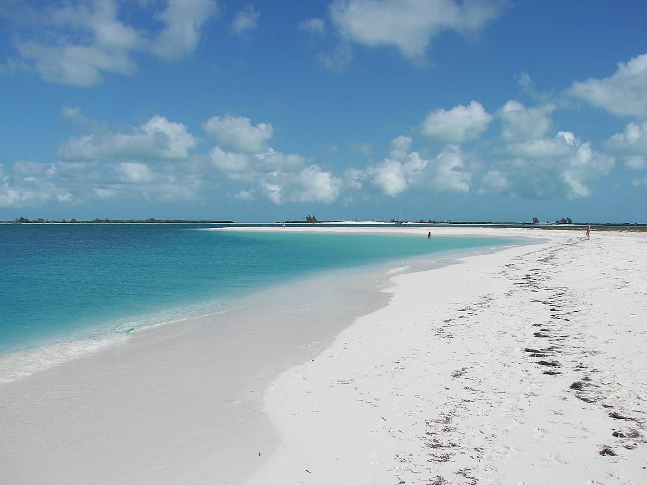 Pristine white sandy beach with turquoise water