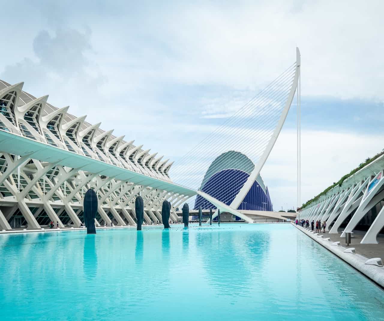 Modern architectural buildings near a blue pool