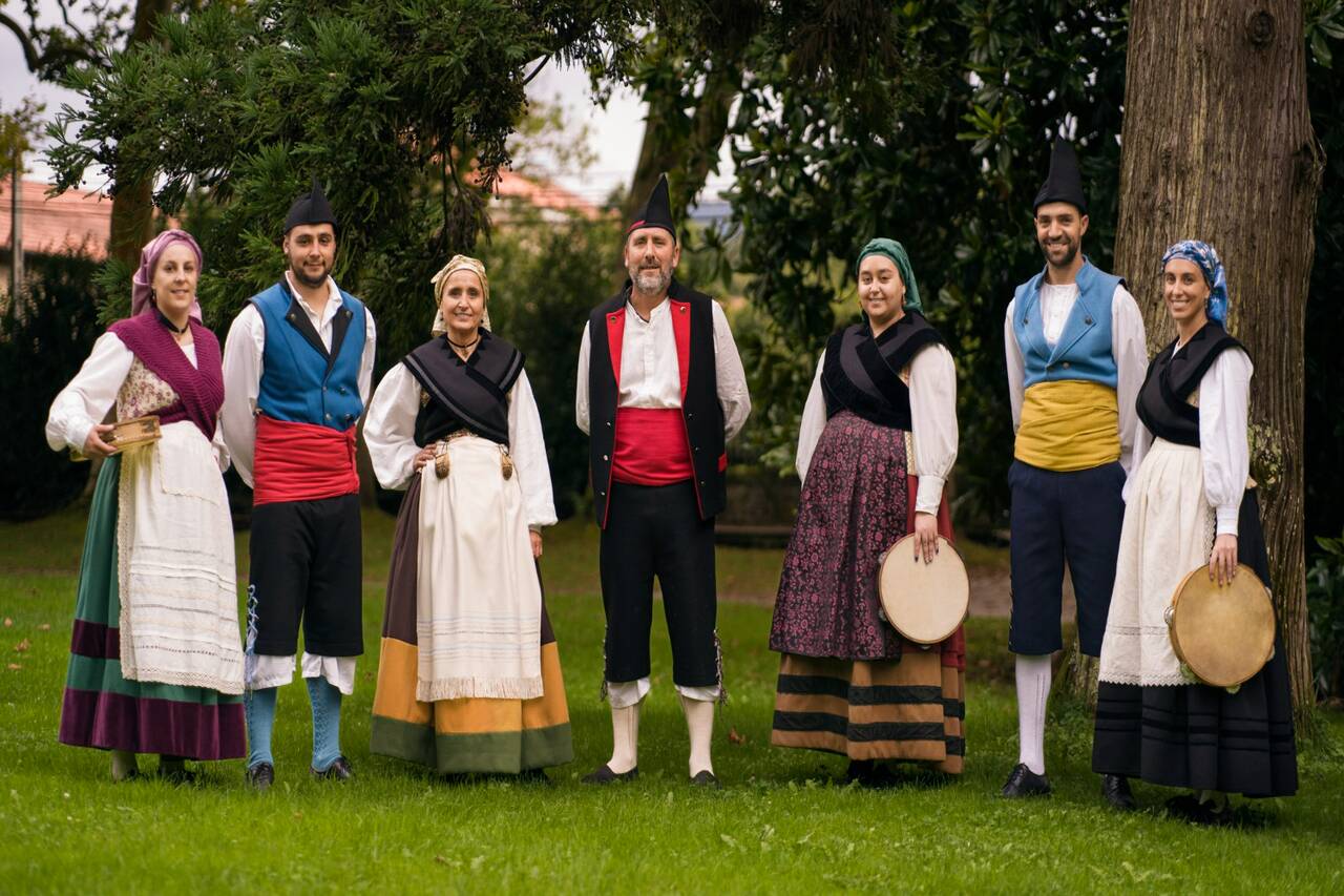 A group of people dressed in traditional folk costumes