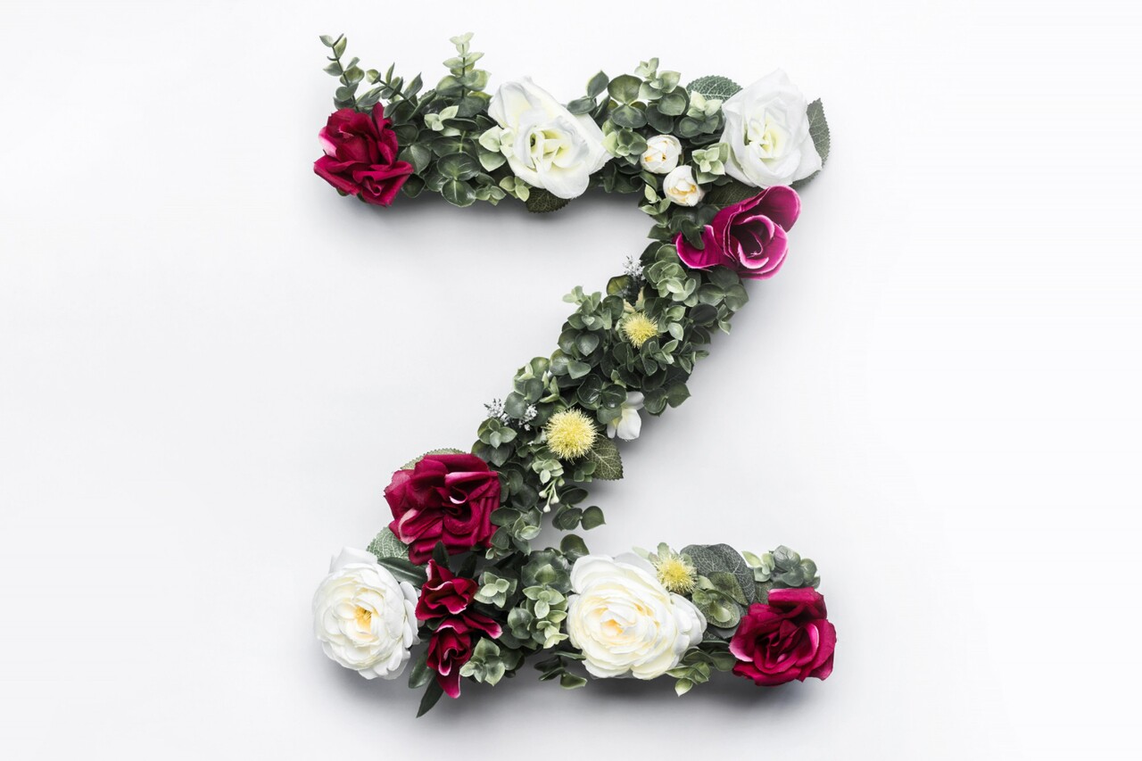 Letter "Z" created with flowers and greenery