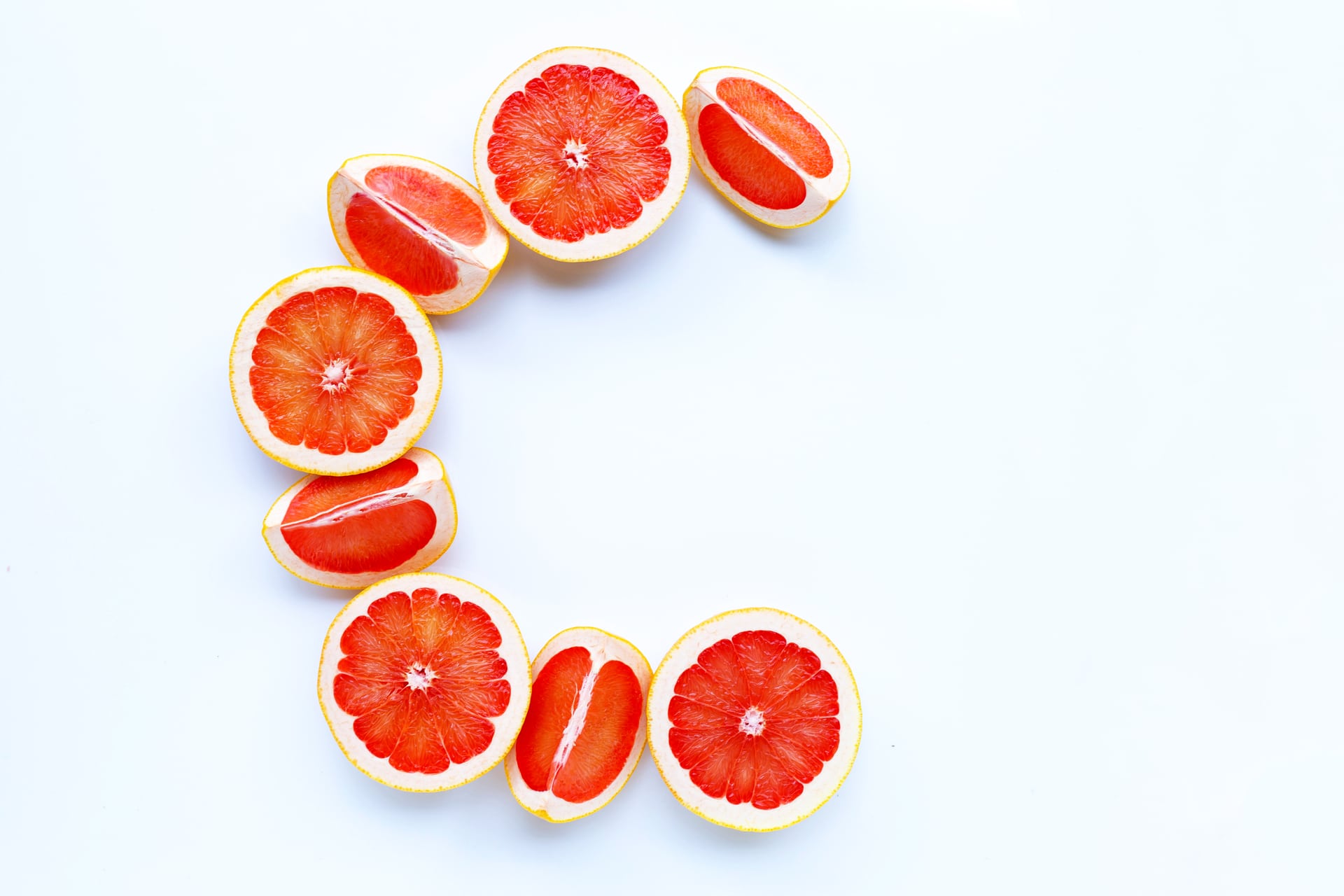 Grapefruit slices arranged in the shape of C
