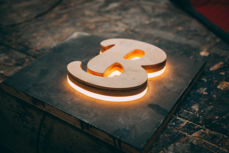 Wooden letter B illuminated from underneath