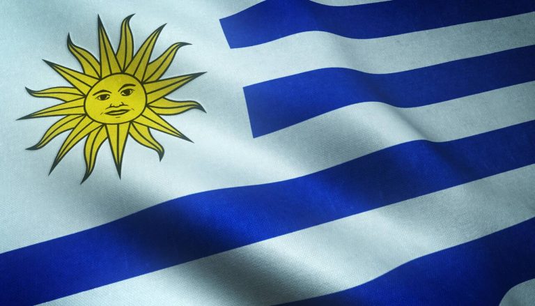 Uruguayan flag with sun emblem and blue stripes