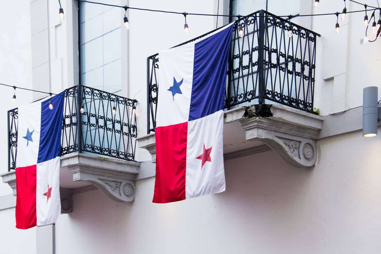Two balconies with hanging Panama flags